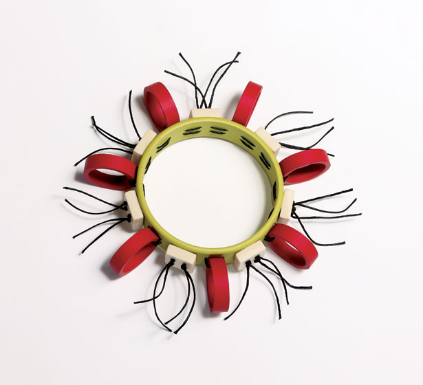 Suburban Tribal 3, bangle. Repurposed plastic conduit & pipe, paint, thread