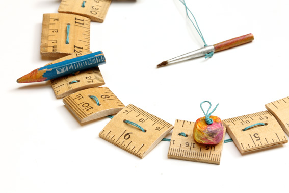 Day 24, unruly, close-up. Upcycled ruler, pencil, eraser, paint brush, and linen thread. © Blandine Hallé 2015